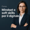 Professionista che utilizza soft skill per il digitale in un ambiente di lavoro moderno